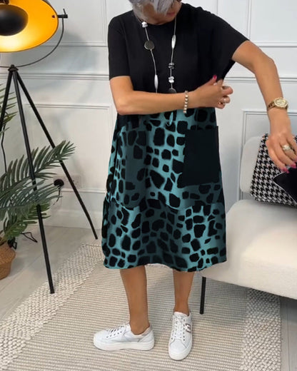 CM | Elegante vestido midi de manga corta con estampado de leopardo