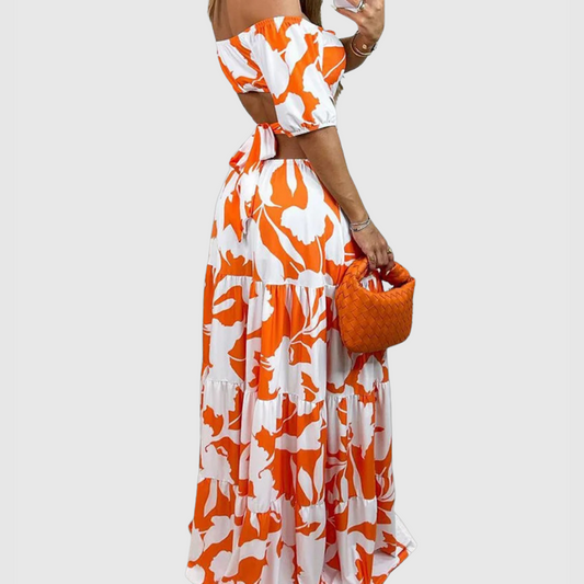 CM | Elegante vestido midi con grano y escote irregulares