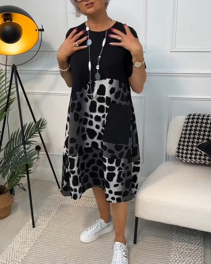 CM | Elegante vestido midi de manga corta con estampado de leopardo