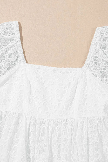 CM | Minivestido de encaje con mangas abullonadas y cintura imperio