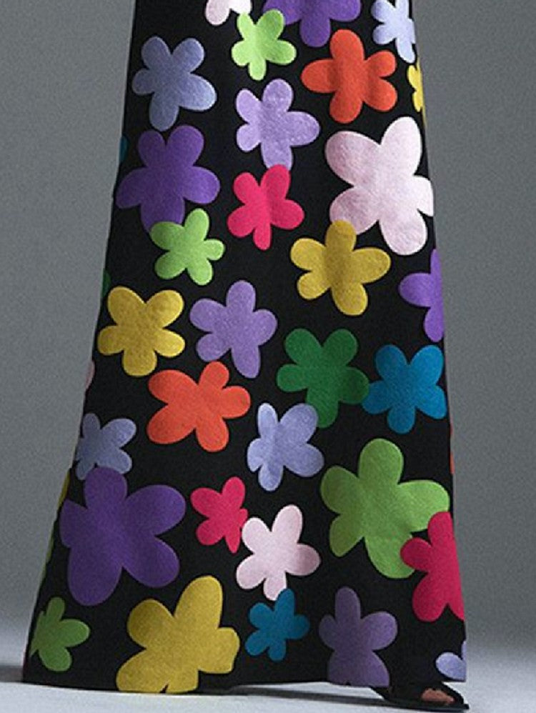 CM | Maxi vestido negro con estampado floral y escote redondo