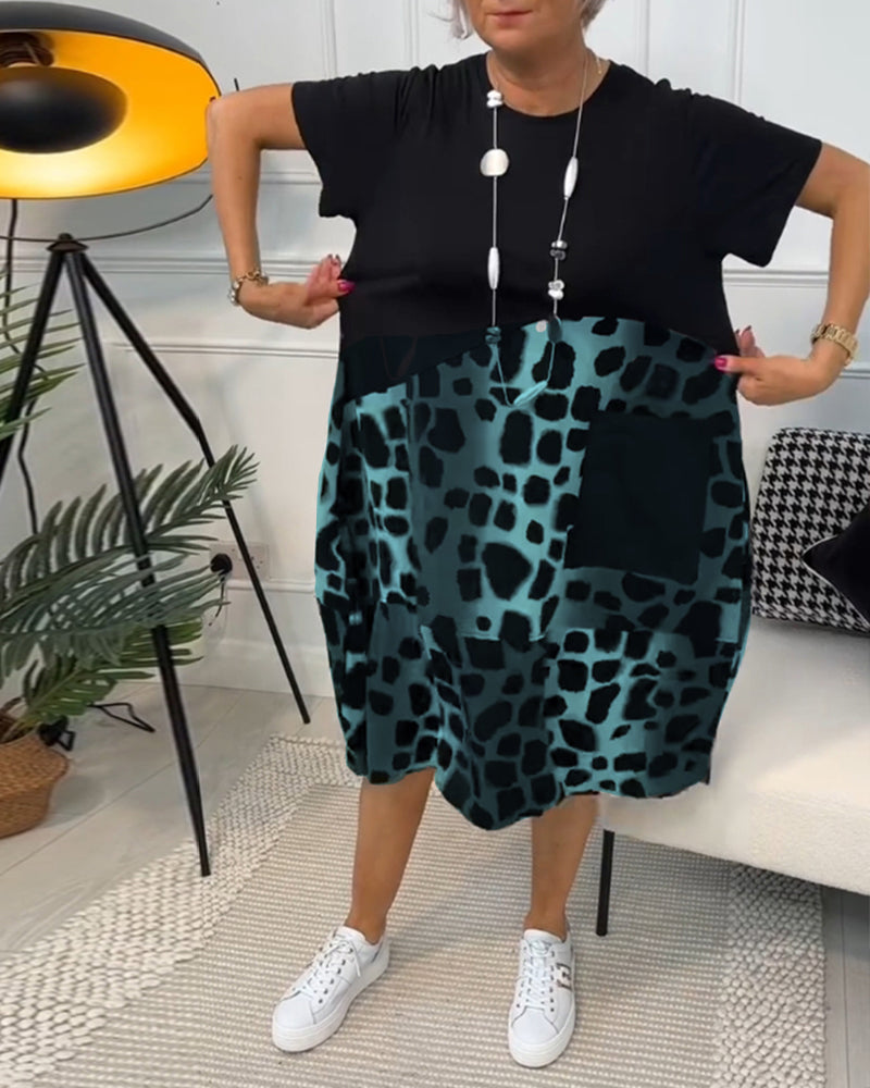 CM | Elegante vestido midi de manga corta con estampado de leopardo