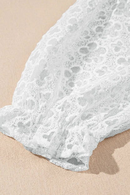 CM | Minivestido de encaje con mangas abullonadas y cintura imperio