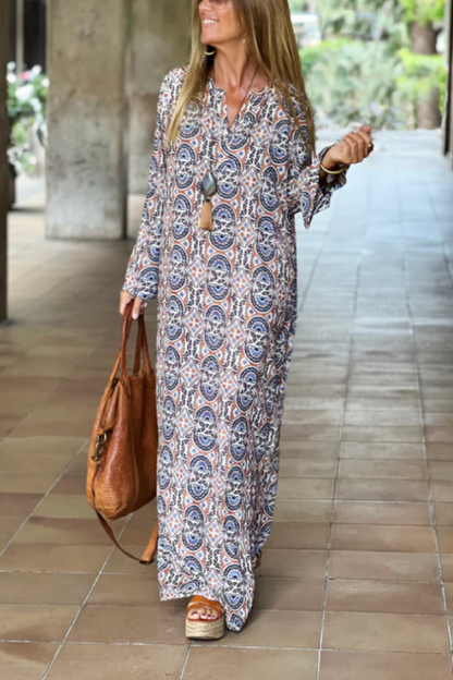 CM | Vestido largo con cuello en V y abertura estampada