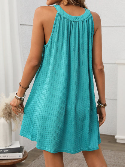 CM | Minivestido texturizado con escote griego