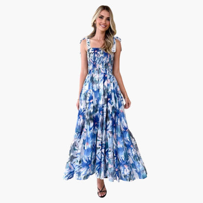 CM | maxi vestido de mujer de gasa con corpiño fruncido y falda con vuelo