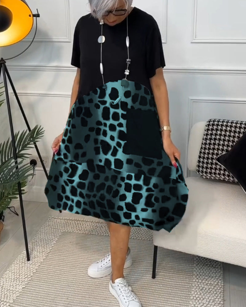 CM | Elegante vestido midi de manga corta con estampado de leopardo
