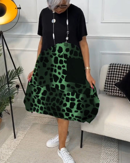 CM | Elegante vestido midi de manga corta con estampado de leopardo