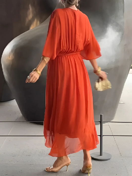 CM | Vestido midi atemporal en un look envolvente