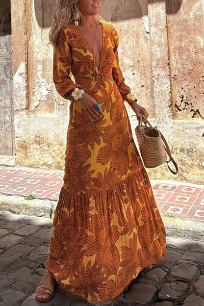 CM | Vestido maxi de manga larga con escote en pico y estampado de girasoles