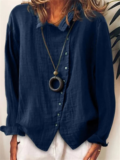 CM | Blusa asimétrica abotonada