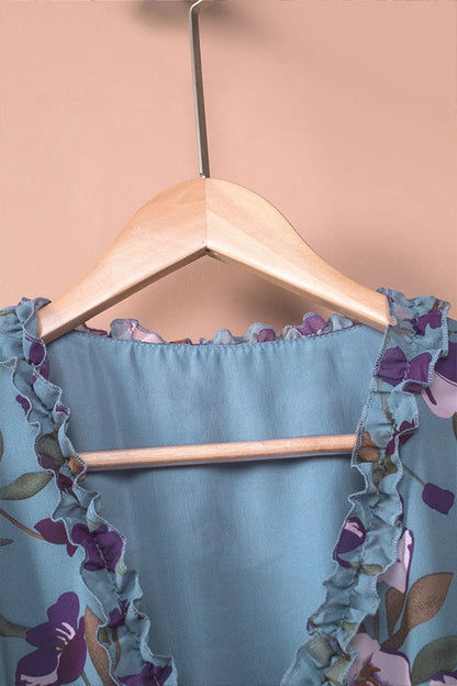CM | Maxi vestido azul claro con estampado floral y ribete de volantes