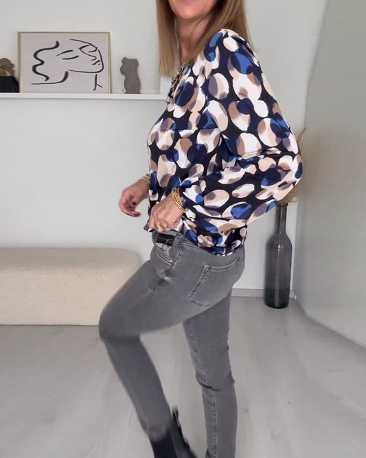 CM | Blusa elegante y versátil
