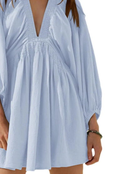 CM | Minivestido texturizado con escote en V