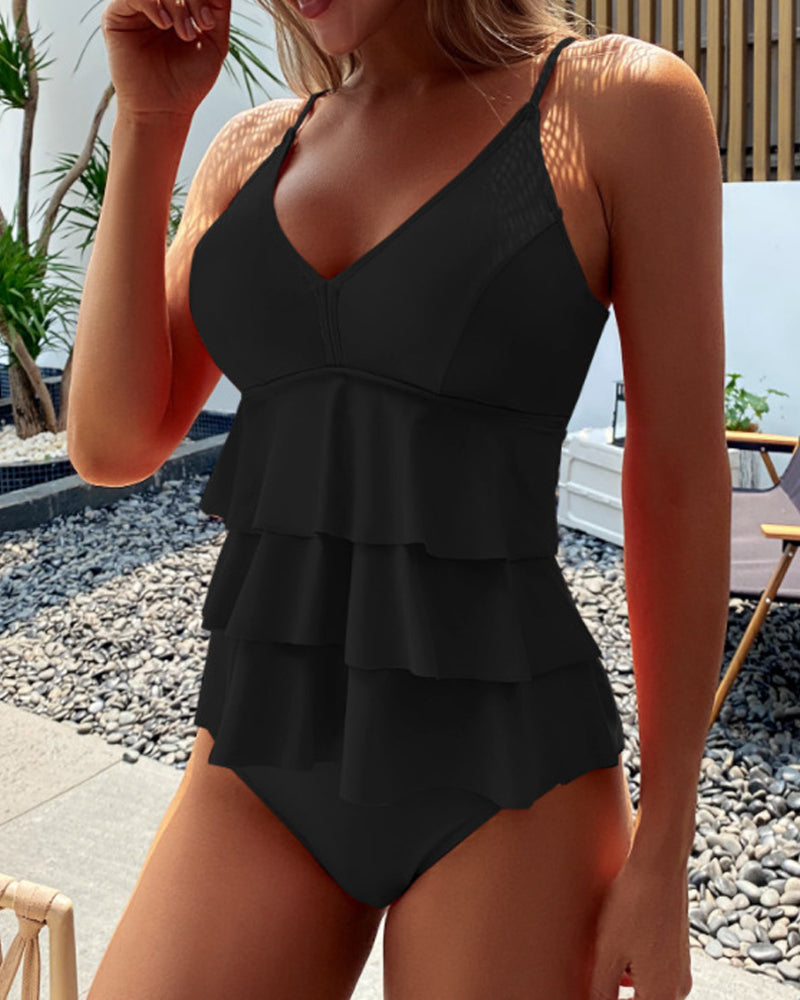 CM | Ruffles split tankini en un color