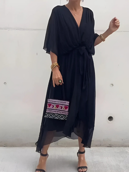 CM | Vestido midi atemporal en un look envolvente