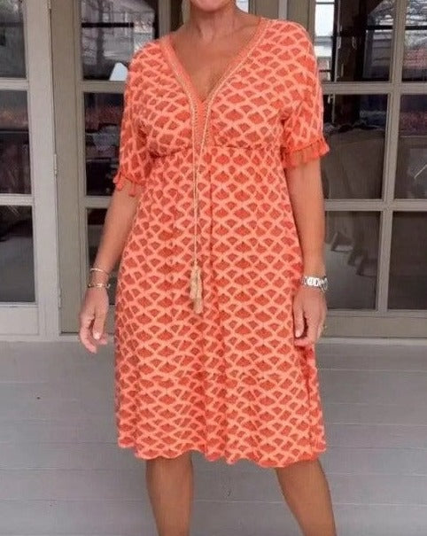 CM | Vestido midi cómodo y holgado con escote en V