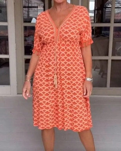 CM | Vestido midi cómodo y holgado con escote en V