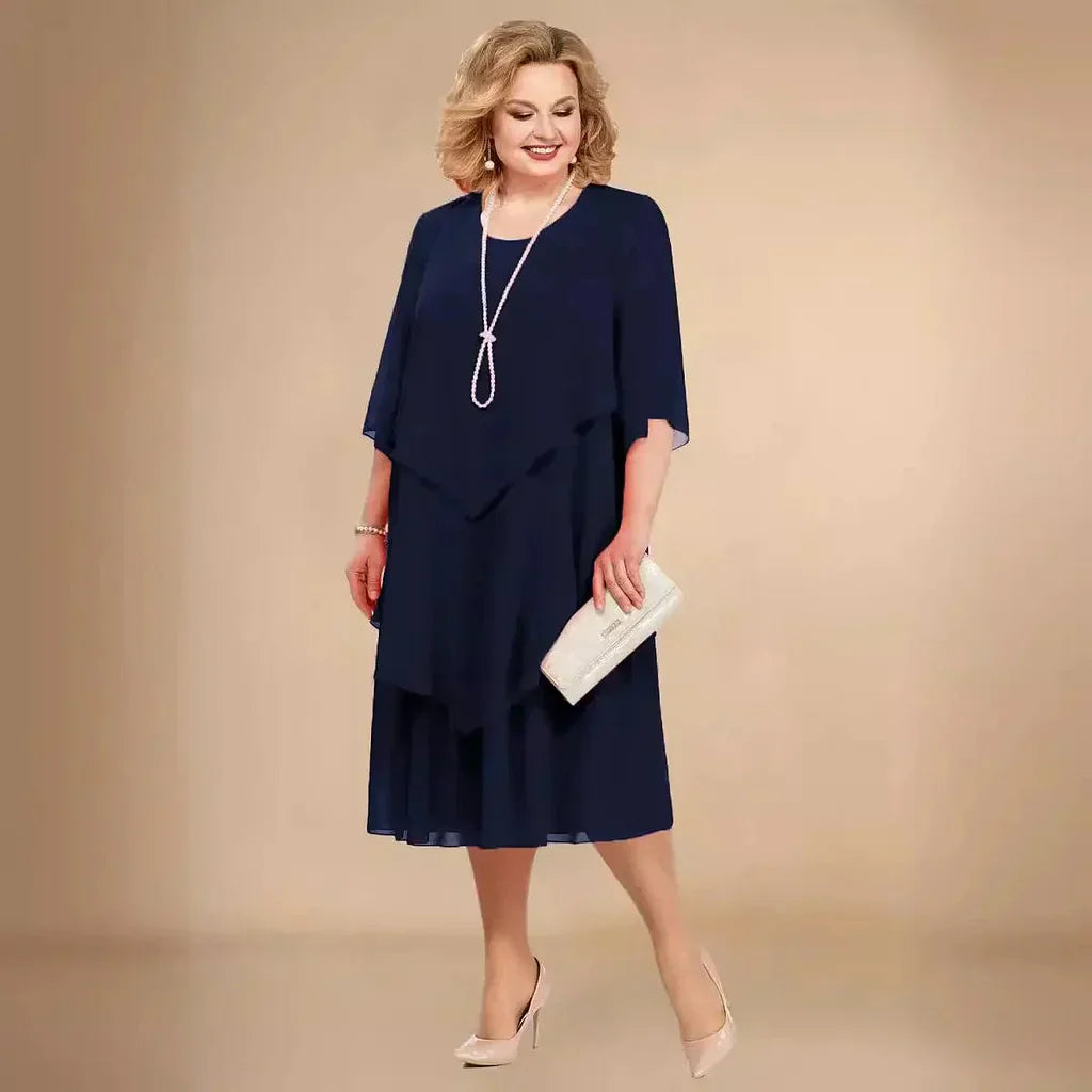 CM | VESTIDO MIDI CON DOBLADILLO EN CAPAS.