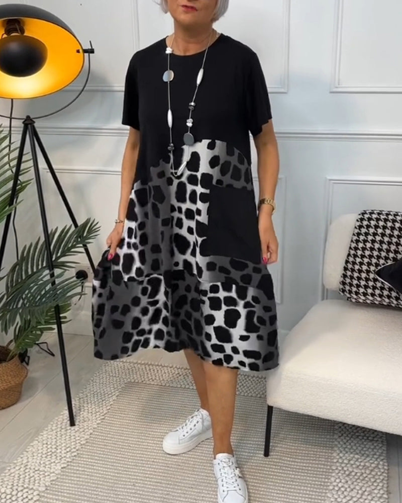 CM | Elegante vestido midi de manga corta con estampado de leopardo