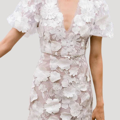 CM | Mini vestido de invitada de boda con mangas abullonadas