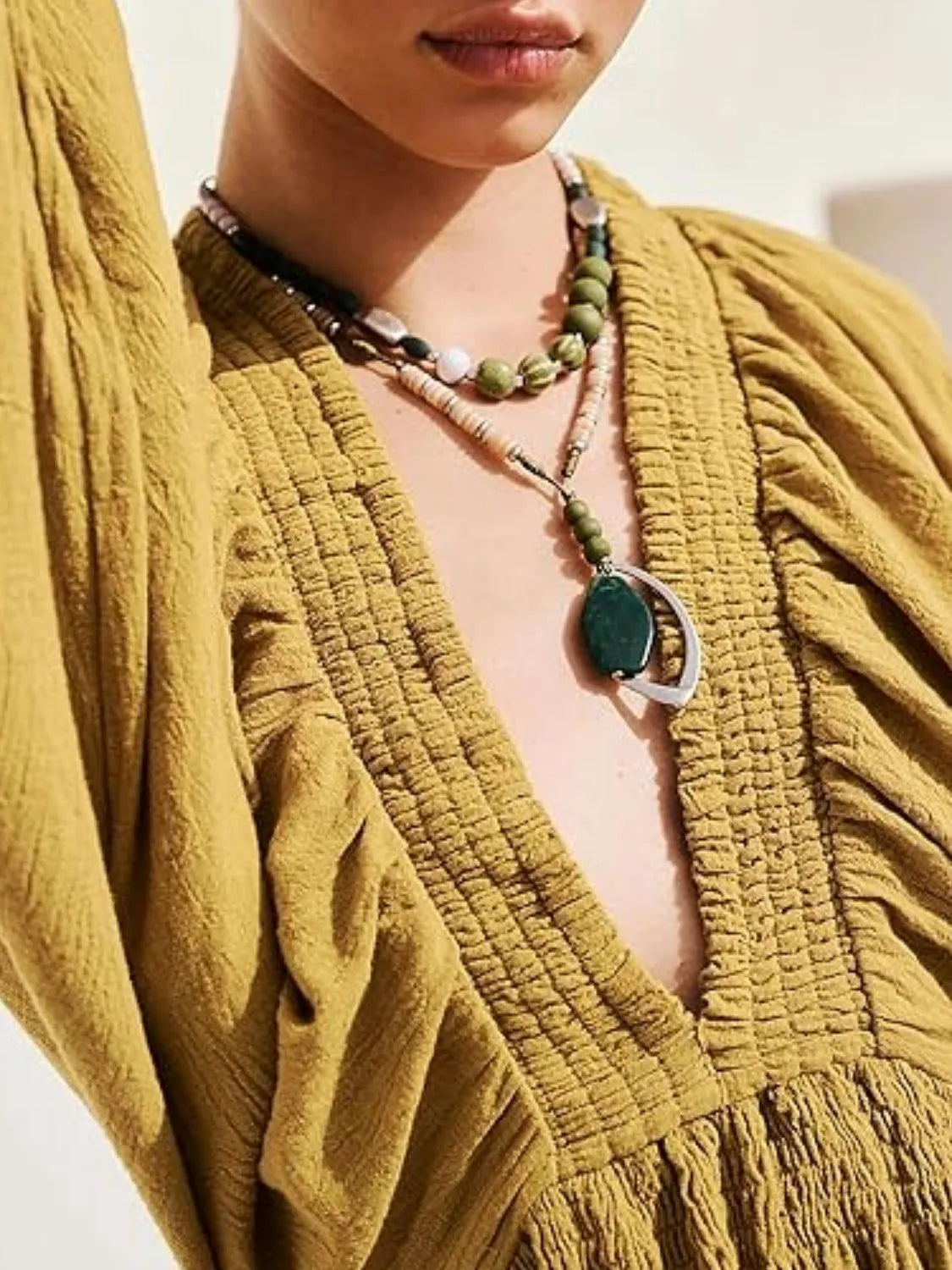 CM | Minivestido texturizado con escote en V