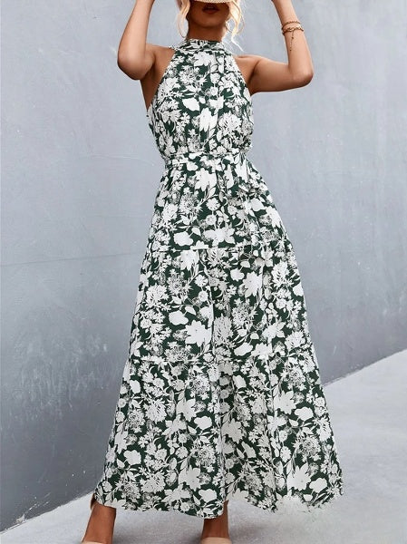 CM | Vestido mono de tirantes y escote halterneck con estampado de lunares ondulados