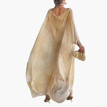 CM | Maxi vestido de mujer en gasa de seda con mangas murciélago y superposiciones