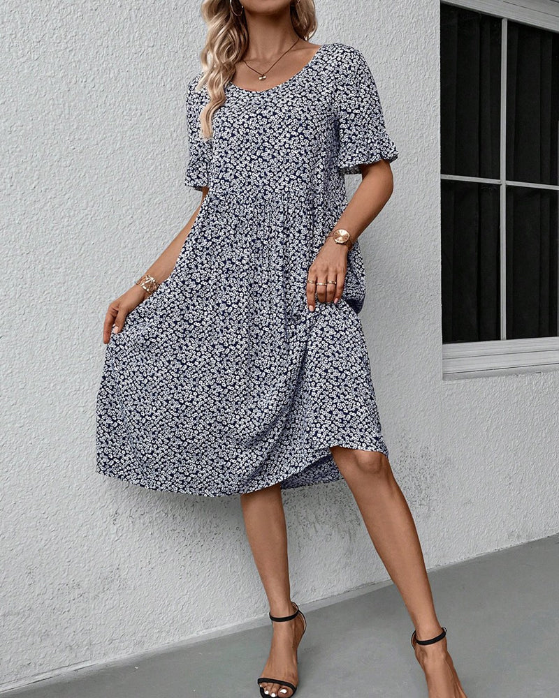 CM | Elegante vestido corto de manga corta y delicado estampado floral