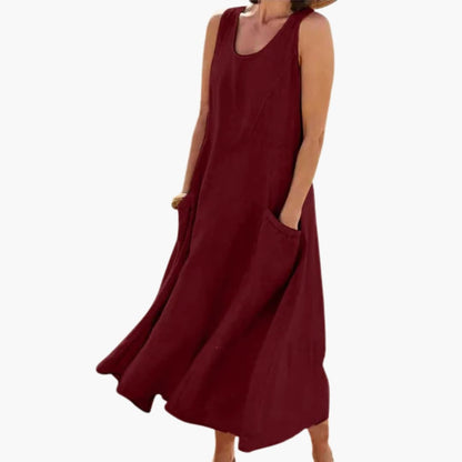 CM | Vestido midi sin mangas de lino para mujer con escote redondo y bolsillos