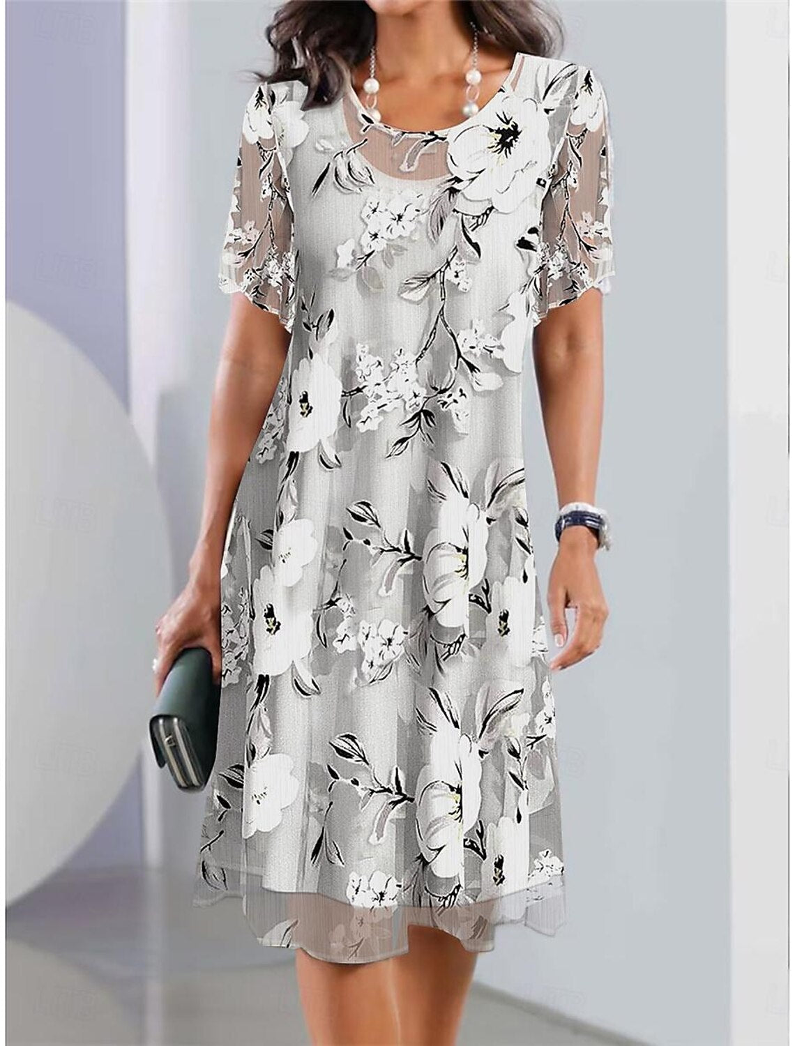 CM | Vestido midi plisado con estampado floral para un estilo elegante y cómodo