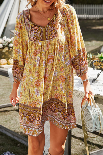 CM | Devine Minivestido estampado con escote anudado