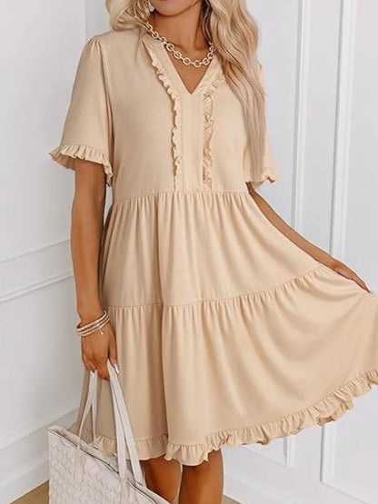 CM | Minivestido de manga corta con escote escalonado