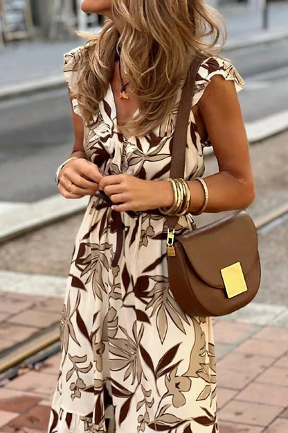 CM | Vestido largo marrón con cuello en V y estampado de hojas