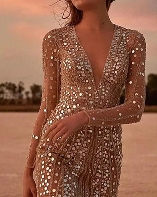 CM | Vestido corto con lentejuelas y manga larga