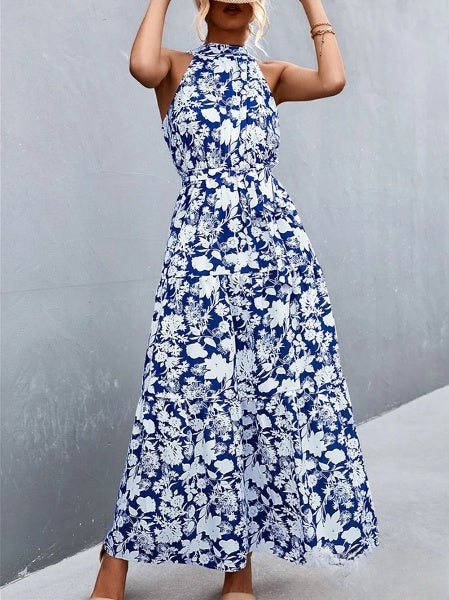 CM | Vestido mono de tirantes y escote halterneck con estampado de lunares ondulados