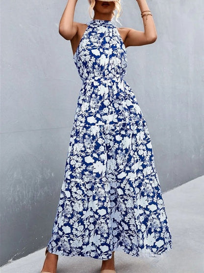 CM | Vestido mono de tirantes y escote halterneck con estampado de lunares ondulados