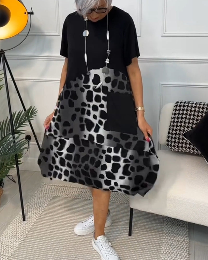 CM | Elegante vestido midi de manga corta con estampado de leopardo