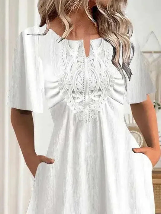 CM | Elegante vestido midi monocolor de manga corta