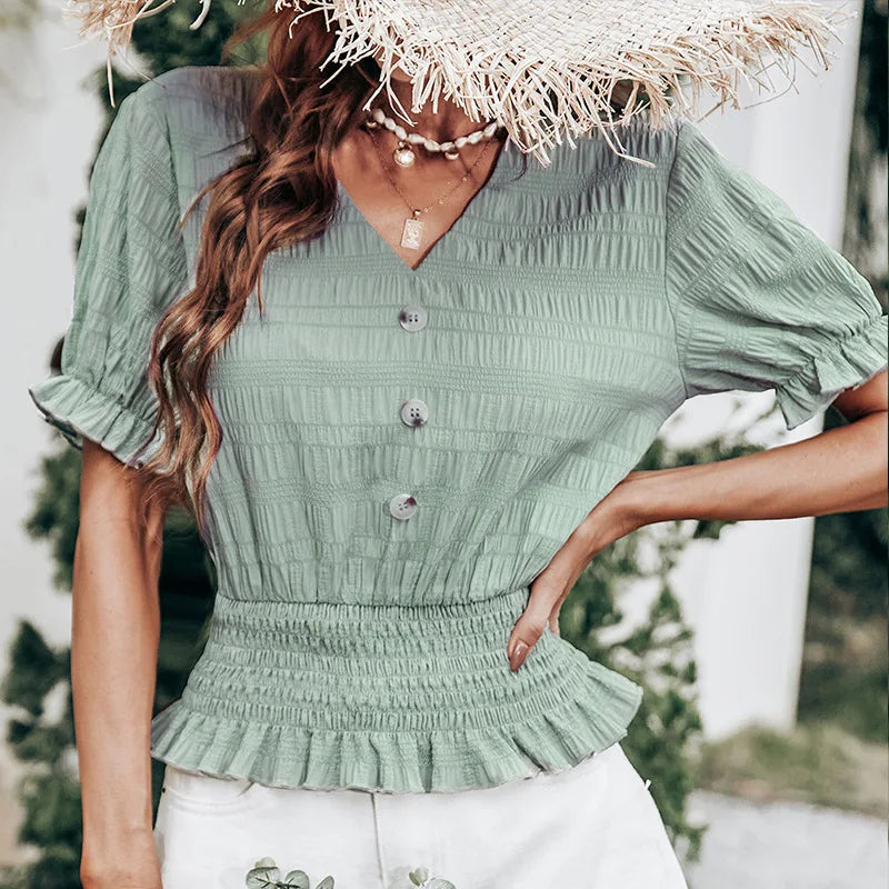 CM | Blusa con cierre de botones y peplum
