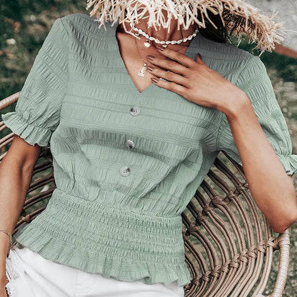 CM | Blusa con cierre de botones y peplum