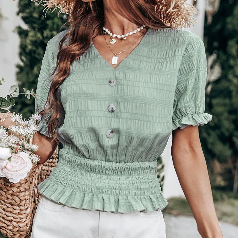 CM | Blusa con cierre de botones y peplum