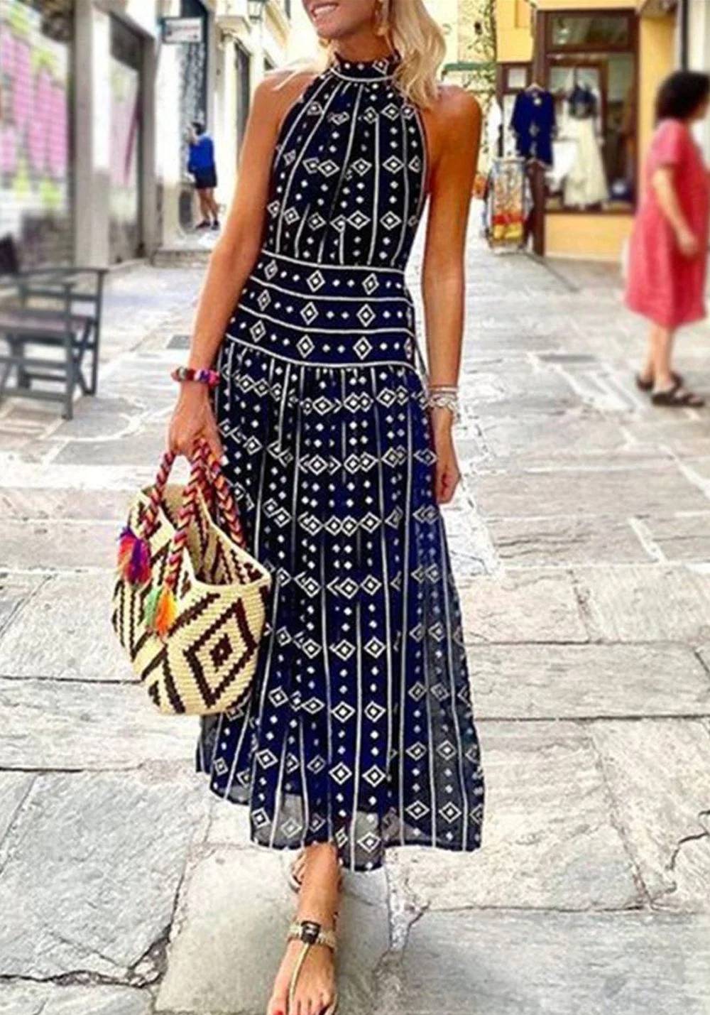 CM | maxi vestido sin mangas con escote mariposa estampado