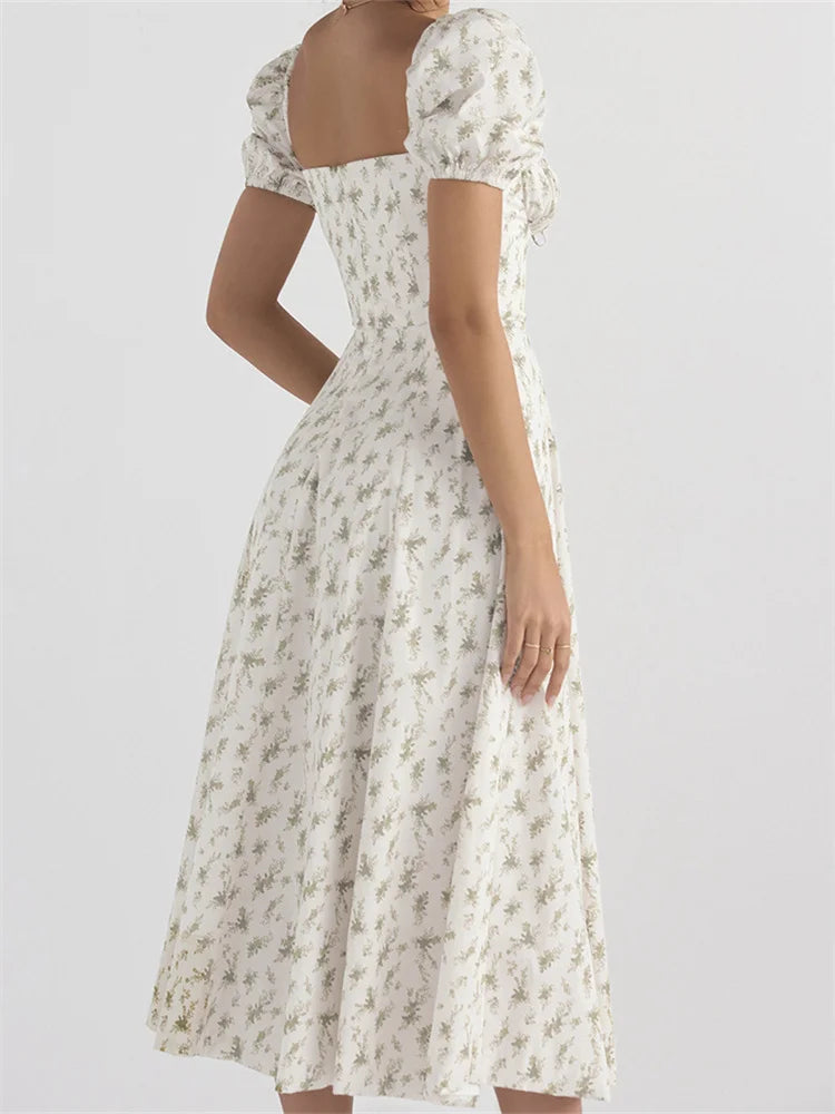 CM | Vestido midi con escote cuadrado, estampado floral y cordones, sin mangas y con tirantes.