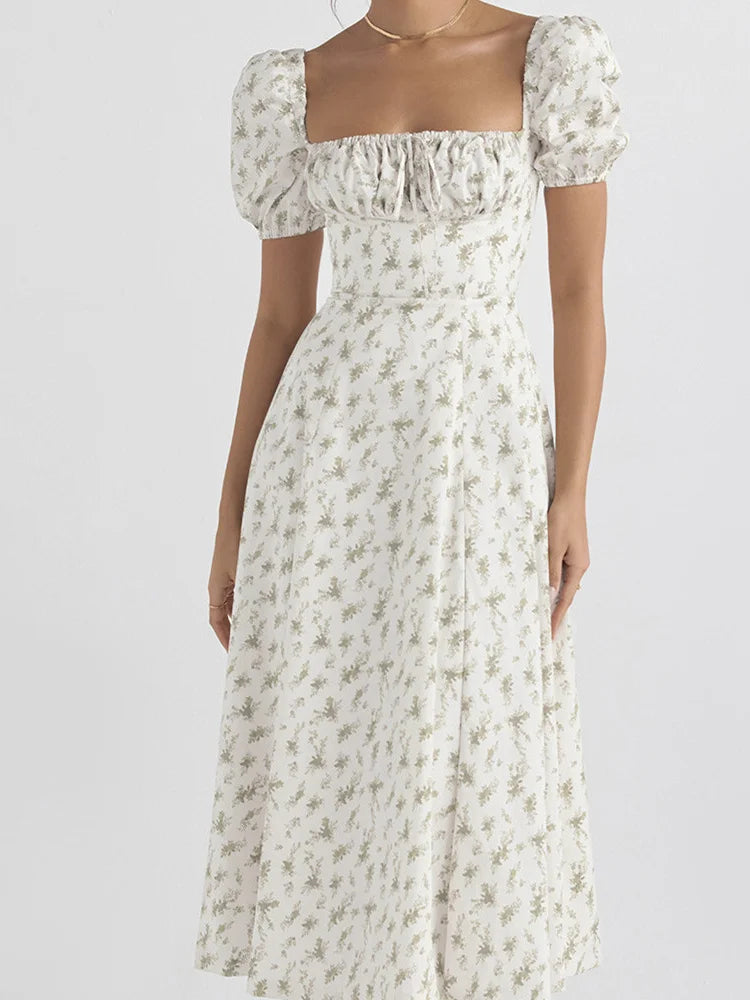 CM | Vestido midi con escote cuadrado, estampado floral y cordones, sin mangas y con tirantes.