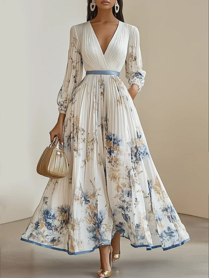 CM | Elegante maxi vestido con mangas abullonadas y escote en V