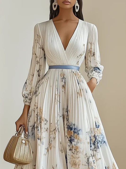 CM | Elegante maxi vestido con mangas abullonadas y escote en V