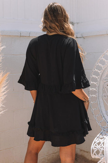 CM | Elegante mini vestido babydoll negro con escote en V