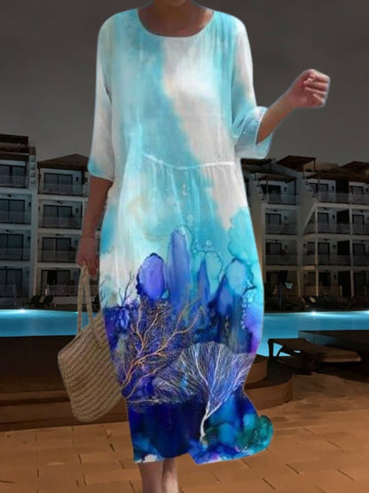 CM | Elegante vestido midi de material ligero y fluido, manga 3/4 con estampado floral