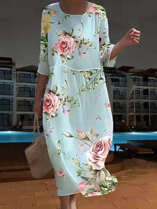 CM | Elegante vestido midi de material ligero y fluido, manga 3/4 con estampado floral